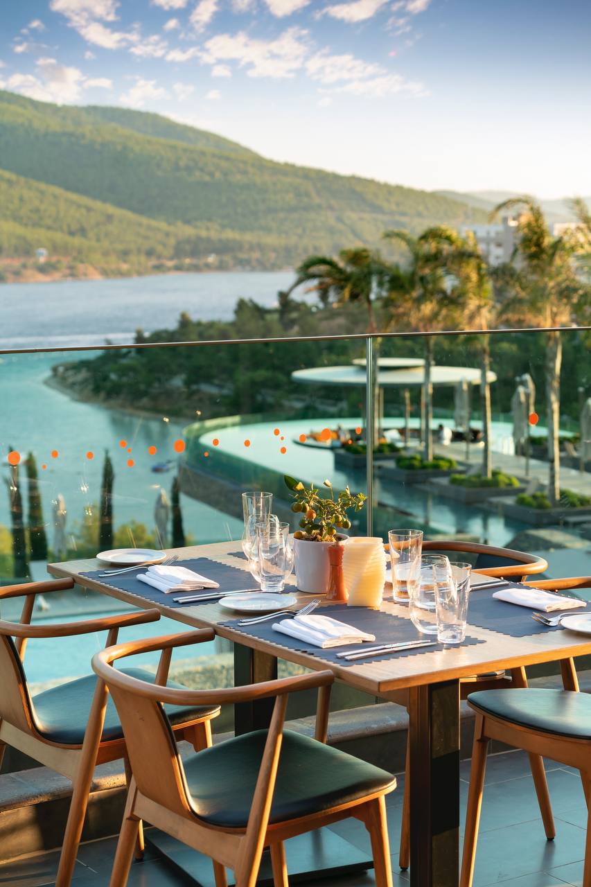 A table with a view of the mountains