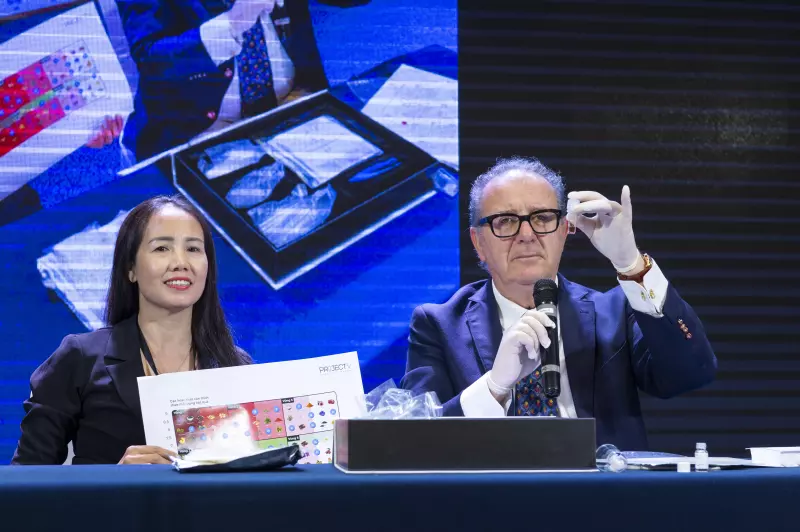 Torello Lotti is holding glasses