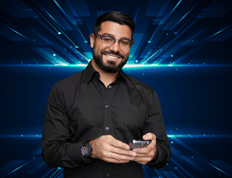 Narek in a black shirt with a phone