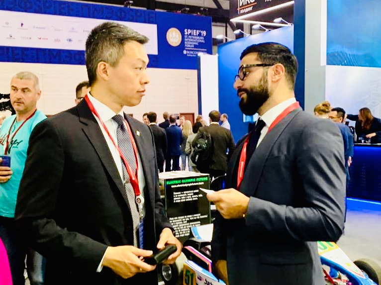 Narek with a person in a black suit at the SPIEF 2019