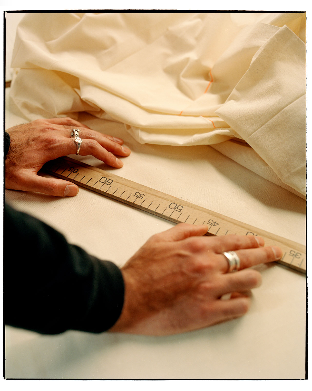 Eric Ambar is measuring with a ruler