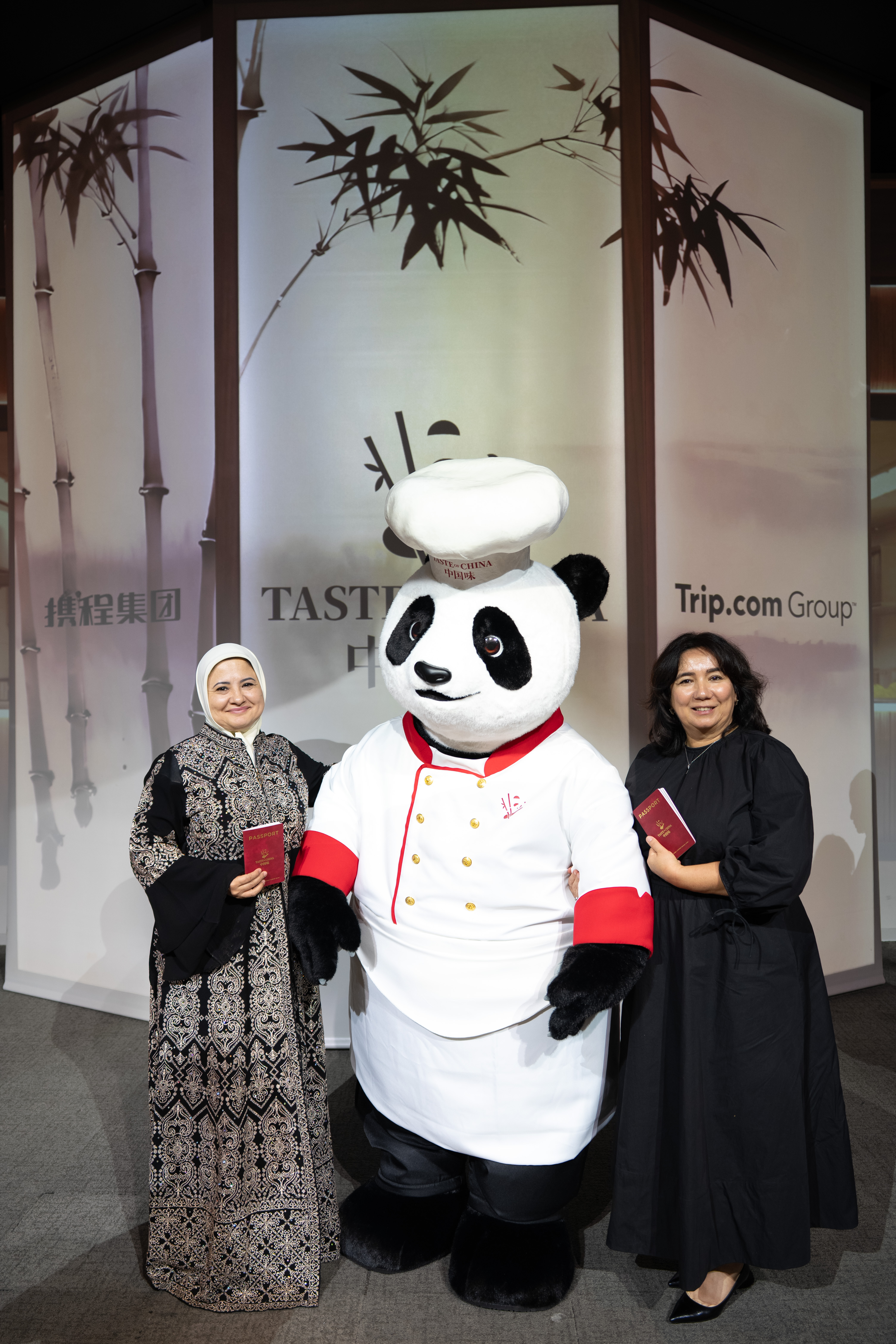 Summit guests with a panda mascot in Shanghai